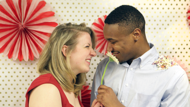 Illustration for article titled This Interracial Couple Is So Beautiful You Won’t Even Care One Of Them Has Coleslaw On His Shoulder